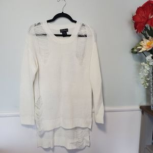 TRENDY THREADS Distressed sweater